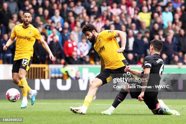 Diego Costa of Wolverhampton Wanderers scores his team's first goal during the Premier League match between Wolverhampton Wanderers and Brentford FC...