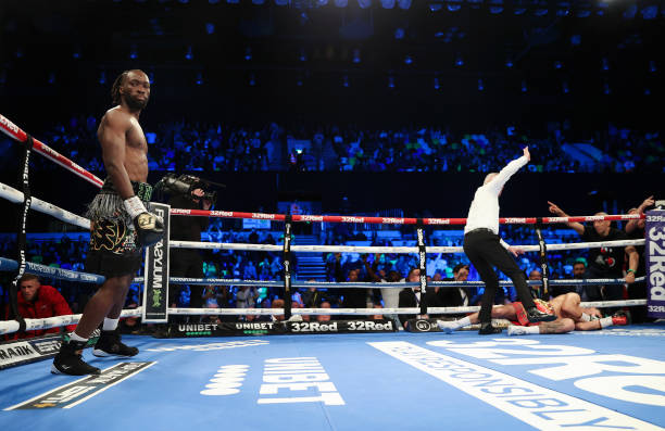 Denzel Bentley reacts after knocking out Kieran Smith during the British Middleweight Title fight between Denzel Bentley and Kieran Smith at Copper...