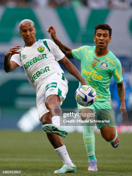 Deyverson of Cuiaba fights for the ball against Marcos Rocha of Palmeiras during a match between Palmeiras and Cuiaba as part of Brasileirao 2023 at...
