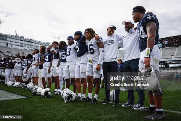 Penn State Nittany Lions players and coaches line up to sing the alma mater after the Penn State Spring Football Game at Beaver Stadium on April 15,...
