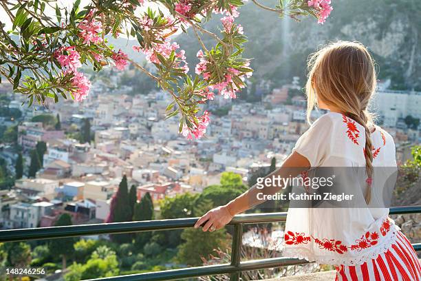 woman enjoying beautiful view, taormina, sicily - taormina stock pictures, royalty-free photos & images