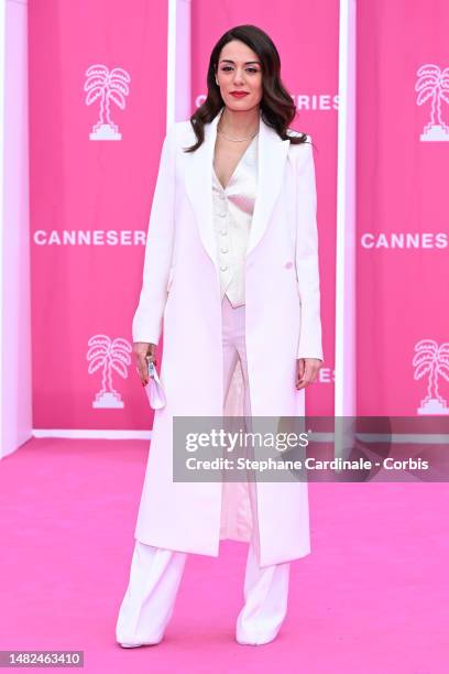 Sofia Essaïdi poses on the pink carpet during the 6th Canneseries International Festival : Day Two on April 15, 2023 in Cannes, France.