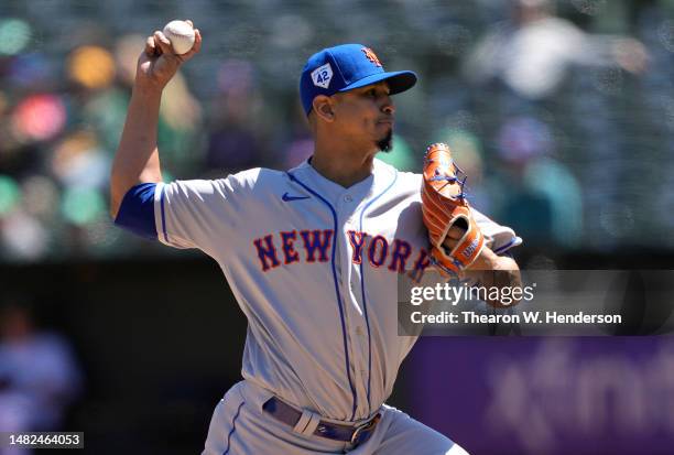 Carlos Carrasco of the New York Mets pitches against the Oakland Athletics in the top of the first inning at RingCentral Coliseum on April 15, 2023...