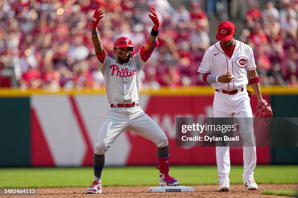 Edmundo Sosa of the Philadelphia Phillies celebrates after hitting a double past Jose Barrero of the Cincinnati Reds in the second inning at Great...