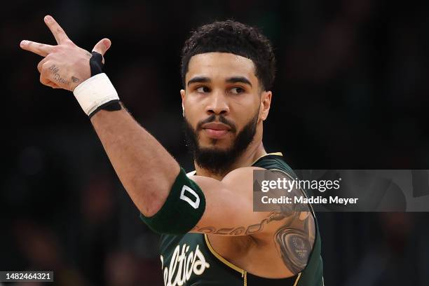 Jayson Tatum of the Boston Celtics celebrates after hitting a three point shot against the Atlanta Hawks during the second quarter of Game One of the...