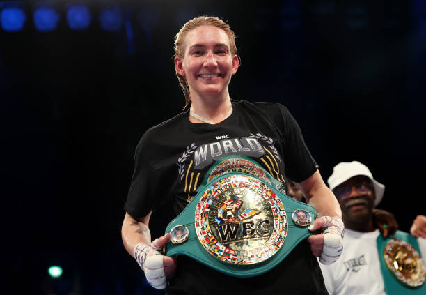 Mikaela Mayer celebrates victory while holding WBC Lightweight belt following the Lightweight fight between Mikaela Mayer and Lucy Wildheart at...