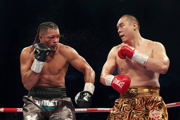 Joe Joyce and Zhilei Zhang exchange punches during the WBO Interim World Heavyweight Title fight between Joe Joyce and Zhilei Zhang at Copper Box...