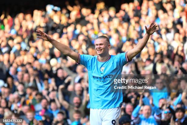 Erling Haaland of Manchester City celebrates scoring a goal to make it 3-0 during the Premier League match between Manchester City and Leicester City...