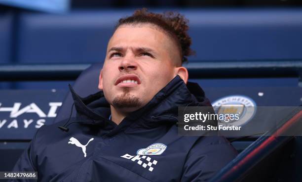 Manchester City substitute Kalvin Phillips looks on from the bench during the Premier League match between Manchester City and Leicester City at...