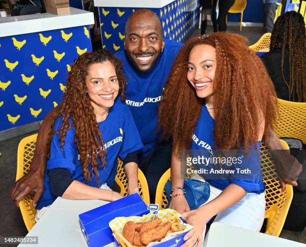 Natasha Duffy, John Salley and Taya Salley attend the Mother Plucker grand opening with TiNDLE at Mother Plucker on April 15, 2023 in Los Angeles,...