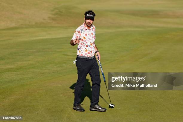 Brett Drewitt of Australia reacts after making a birdie on the 18th hole during the third round of the Veritex Bank Championship at Texas Rangers...