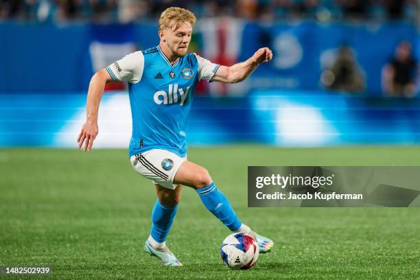 Kamil Jóźwiak of Charlotte FC brings the ball up the field in the first half during their game against the Colorado Rapids at Bank of America Stadium...