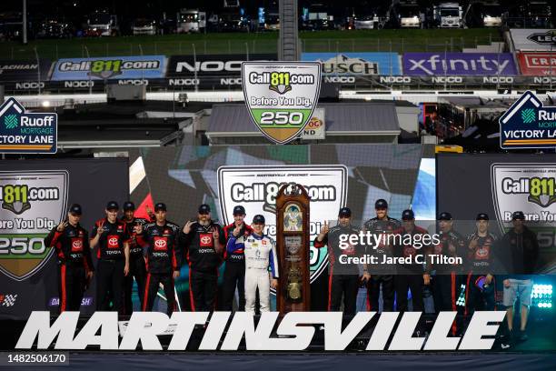 John Hunter Nemechek, driver of the Pye Barker Fire & Safety Toyota, and crew celebrate in victory lane after winning the NASCAR Xfinity...