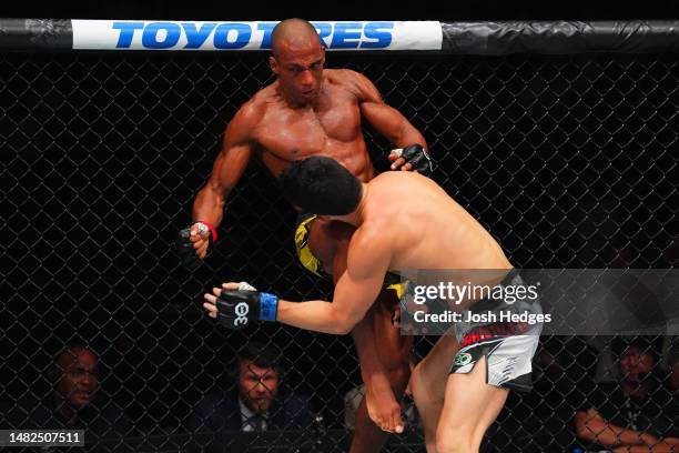 Edson Barboza of Brazil lands a knee to the chin of Billy Quarantillo in a featherweight fight during the UFC Fight Night event at T-Mobile Center on...