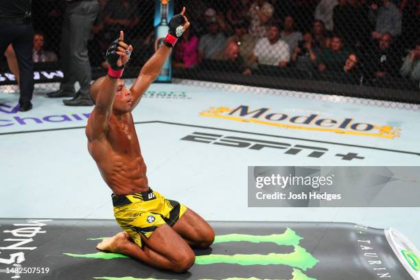 Edson Barboza of Brazil reacts after knocking out Billy Quarantillo in a featherweight fight during the UFC Fight Night event at T-Mobile Center on...