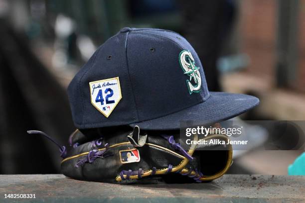 Crawford of the Seattle Mariners's glove and hat featuring a Jackie Robinson Day patch during the game against the Colorado Rockies at T-Mobile Park...