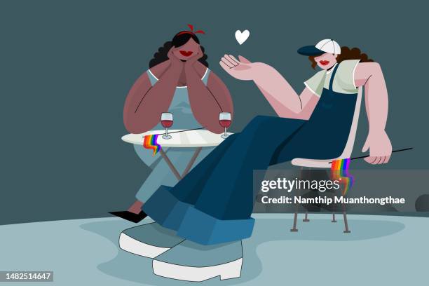 pride month illustration concept shows a lovely lesbian couple dating in restaurants after celebrating the pride month that showing human rights of marriage equality. - holding flag stock pictures, royalty-free photos & images