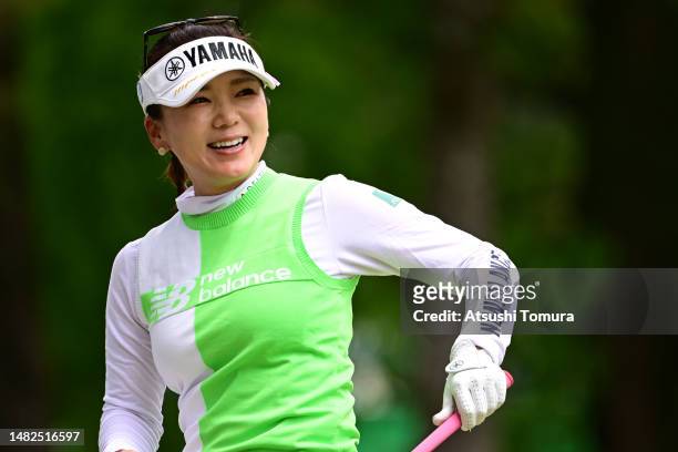Chie Arimura of Japan smiles on the 17th tee during the final round of KKTcup VANTELIN Ladies Open at Kumamoto Kuko Country Club on April 16, 2023 in...