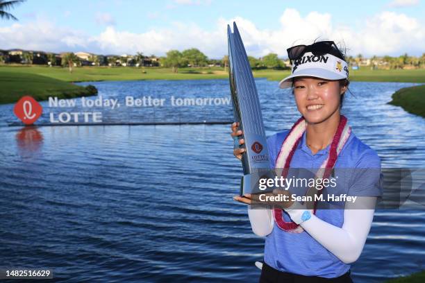 Grace Kim of Australia poses with the Lotte Championship trophy after winning the LOTTE Championship presented by Hoakalei at Hoakalei Country Club...