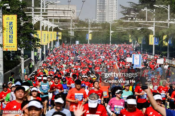 Runners compete during the Wuhan Marathon 2023 on April 16, 2023 in
