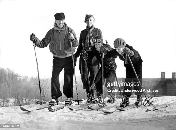 British Embassy staff member and his family enjoy the record snows in Washingon DC for a rare afternoon of skiing, Washington DC, December 31, 1935.
