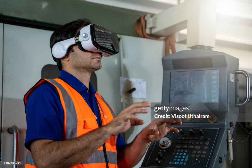 Engineer Wearing Vr Gear To Visualize Projects High-Res Stock Photo ...