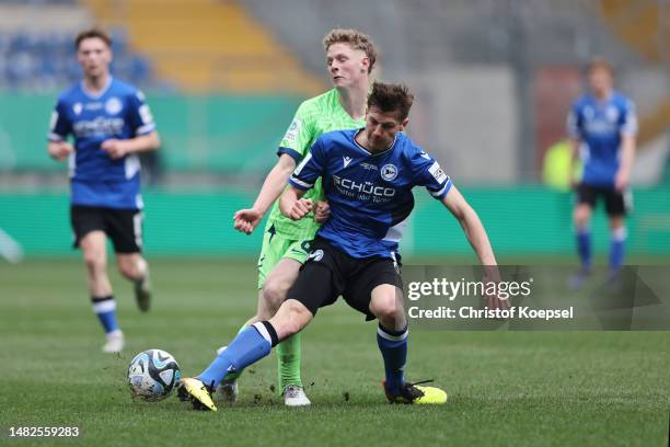 Henry Obermeyer of Bielefeld challenges Oskar Prokopp of Wolfsburg during the B Juniors German Championship Final between Arminia Bielefeld and VfL...