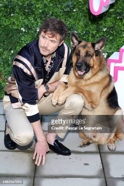 John Reardon and German shepherd Diesel vom Burgimwald attend the Hudson & Rex Photocall during Day Three of the 6th Canneseries International...