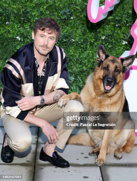 John Reardon and German shepherd Diesel vom Burgimwald attend the Hudson & Rex Photocall during Day Three of the 6th Canneseries International...