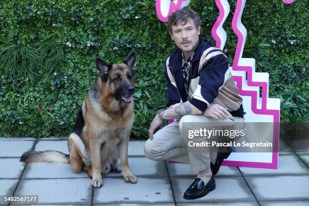 John Reardon and German shepherd Diesel vom Burgimwald attend the Hudson & Rex Photocall during Day Three of the 6th Canneseries International...