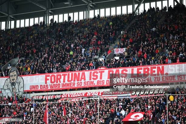 Fans show their support prior to the Second Bundesliga match between Fortuna Düsseldorf and SV Darmstadt 98 at Merkur Spiel-Arena on April 16, 2023...