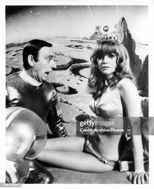 Dick Martin reacting to bikini clad Pamela Rodgers in a scene from the film 'The Maltese Bippy', 1969.