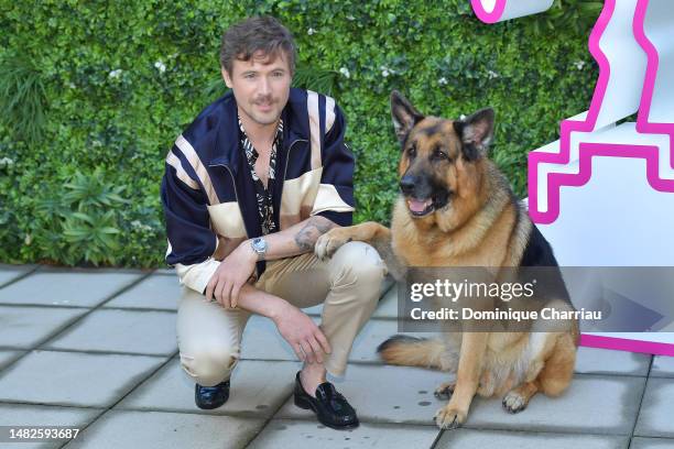 John Reardon and Diesel Vom Burgimwald aka Rex attend the Hudson & Rex Photocall during the 6th Canneseries International Festival : Day Three on...