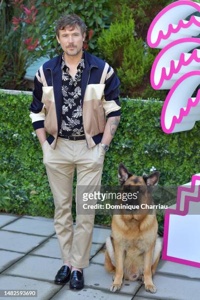 John Reardon and Diesel Vom Burgimwald aka Rex attend the Hudson & Rex Photocall during the 6th Canneseries International Festival : Day Three on...