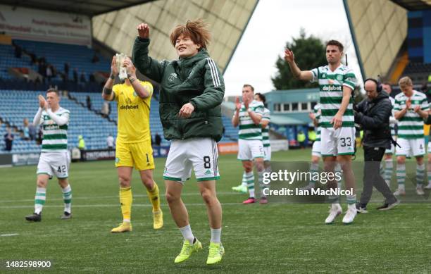 Kyogo Furuhashi of Celtic celebrates at full time in front of the Celtic fans during the Cinch Scottish Premiership match between Kilmarnock FC and...