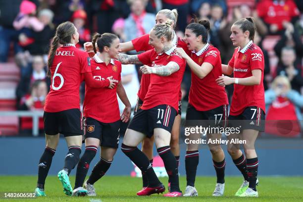 Leah Galton of Manchester United celebrates with teammates during the Vitality Women's FA Cup Semi Final match between Manchester United Women and...