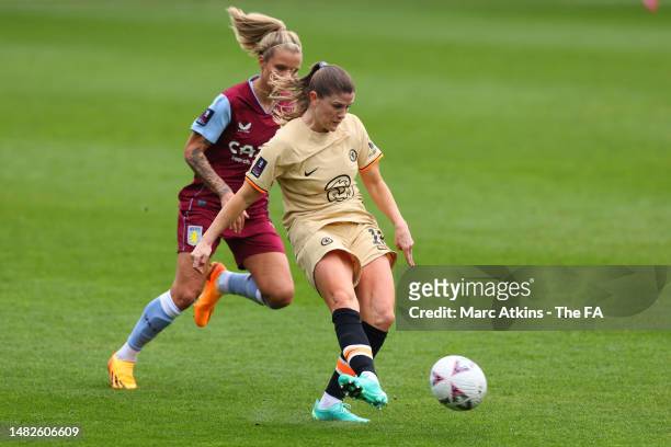 Maren Mjelde of Chelsea passes the ball whilst under pressure from Rachel Daly of Aston Villa during the Vitality Women's FA Cup Semi Final match...