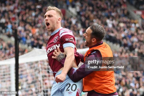 Jarrod Bowen of West Ham United celebrates with teammate Danny Ings after scoring the team's second goal during the Premier League match between West...