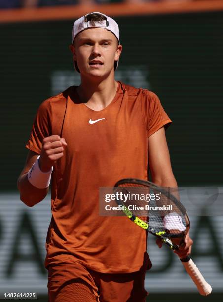 Holger Rune of Denmark celebrates a point against Andrey Rublev in their singles final match during day eight of the Rolex Monte-Carlo Masters at...