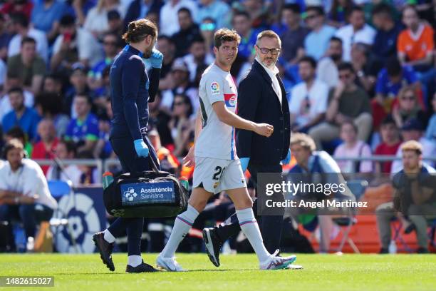 Sergi Roberto of FC Barcelona is substituted after sustaining an injury during the LaLiga Santander match between Getafe CF and FC Barcelona at...