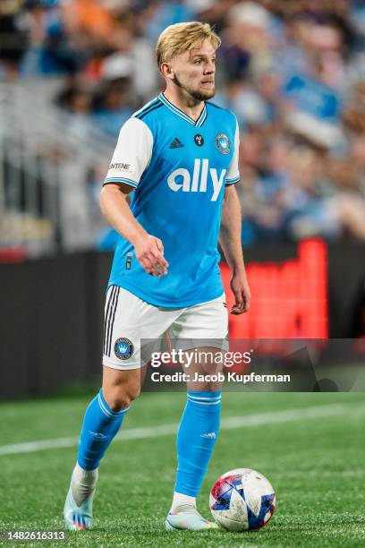 Kamil Jóźwiak of Charlotte FC brings the ball up the field against the Colorado Rapids during their game at Bank of America Stadium on April 15, 2023...