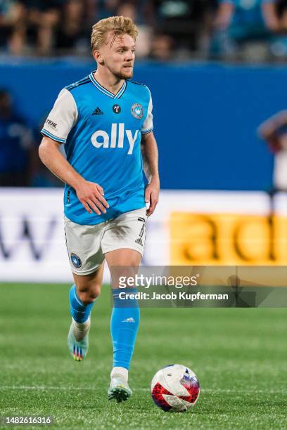 Kamil Jóźwiak of Charlotte FC brings the ball up the field against the Colorado Rapids during their game at Bank of America Stadium on April 15, 2023...