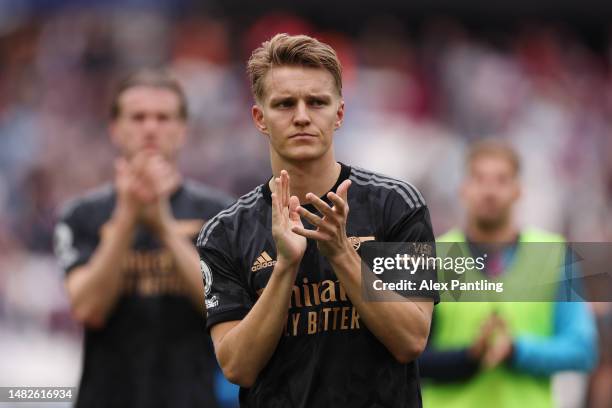 Martin Odegaard of Arsenal acknowledges the fans following the Premier League match between West Ham United and Arsenal FC at London Stadium on April...