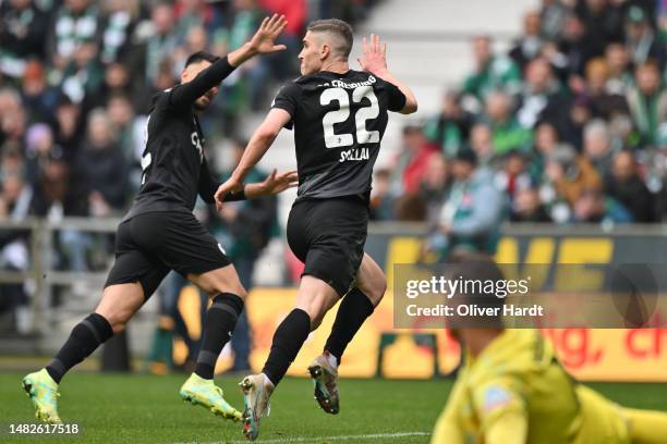 Roland Sallai of Sport-Club Freiburg celebrates after scoring the team's first goal during the Bundesliga match between SV Werder Bremen and...