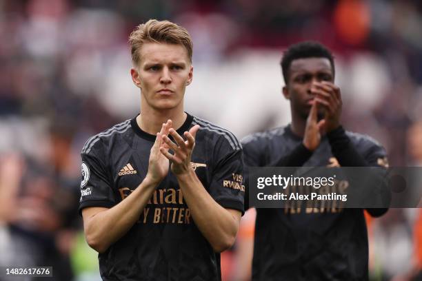 Martin Odegaard of Arsenal acknowledges the fans following the Premier League match between West Ham United and Arsenal FC at London Stadium on April...