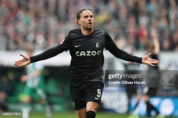 Lucas Hoeler of Sport-Club Freiburg celebrates after scoring the team's second goal during the Bundesliga match between SV Werder Bremen and...