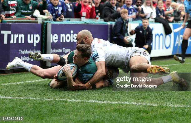 Chris Ashton of Leicester Tigers is fouled by Olly Woodburn of Exeter Chiefs leading to a second yellow card during the Gallagher Premiership Rugby...