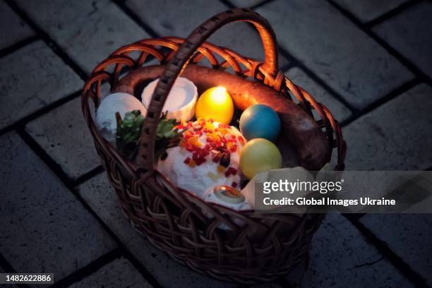 Basket with Easter bread and other offerings before blessing at the St. Michael's Golden-Domed Monastery on April 16, 2023 in Kyiv, Ukraine....
