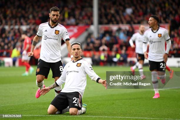 Antony of Manchester United celebrates with teammate Bruno Fernandes after scoring the team's first goal during the Premier League match between...