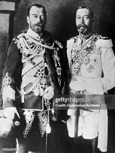Here are two cousins, Czar Nicholas II of Russia, at left, wearing an English uniform, and King George V of England, in Russian regimentals, England,...
